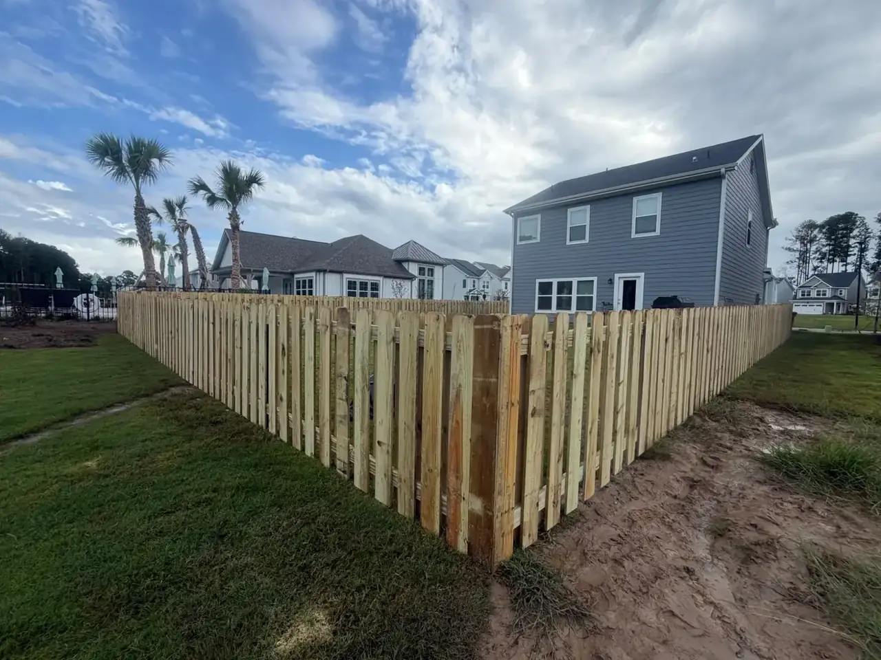 Omega Fence wood privacy fence