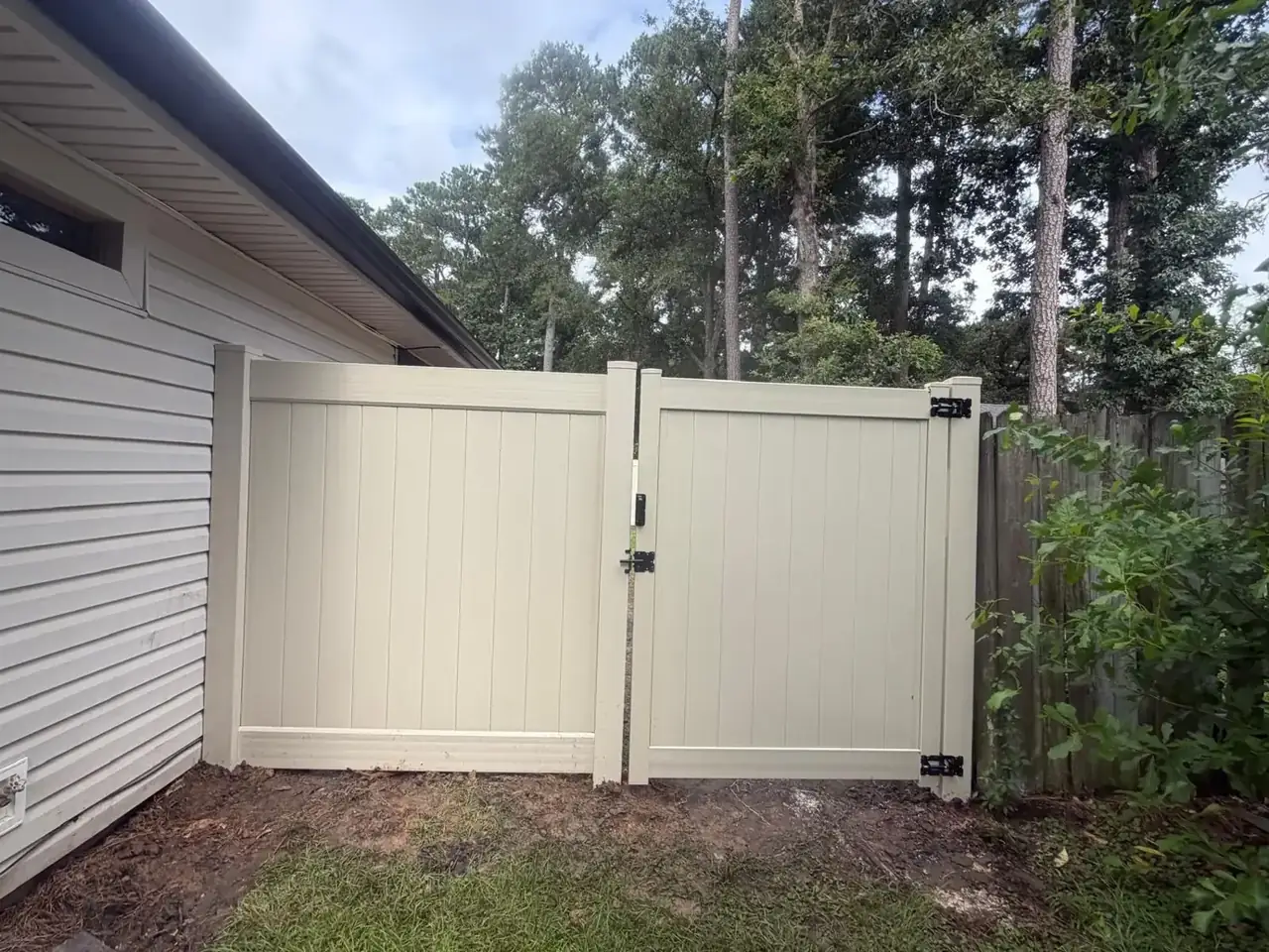 Omega Fence vinyl gate installation