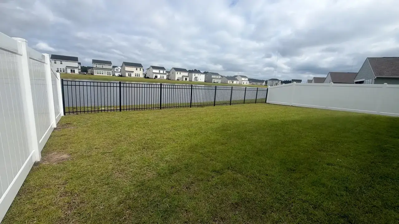 Omega Fence vinyl and aluminum fence