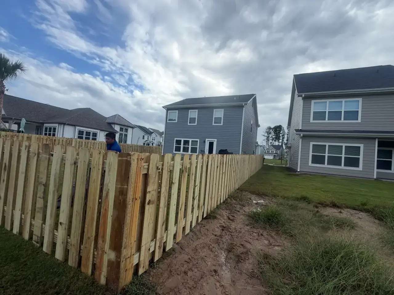 Omega Fence wood privacy fence