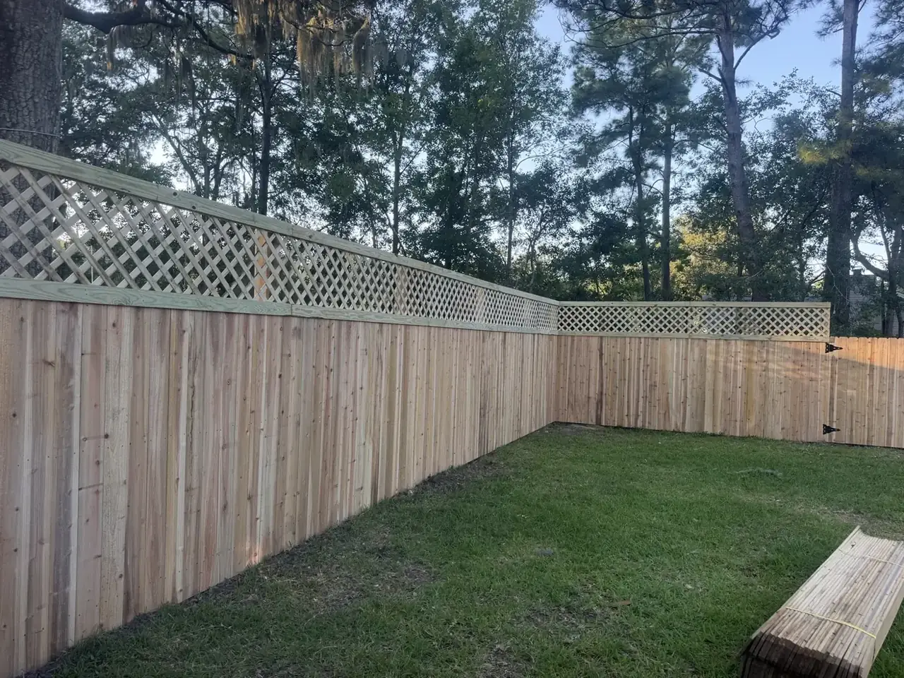 Omega Fence lattice-top wood privacy fence