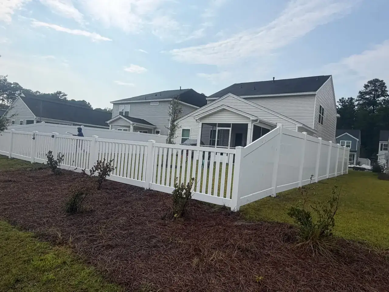 Omega Fence white vinyl picket fence
