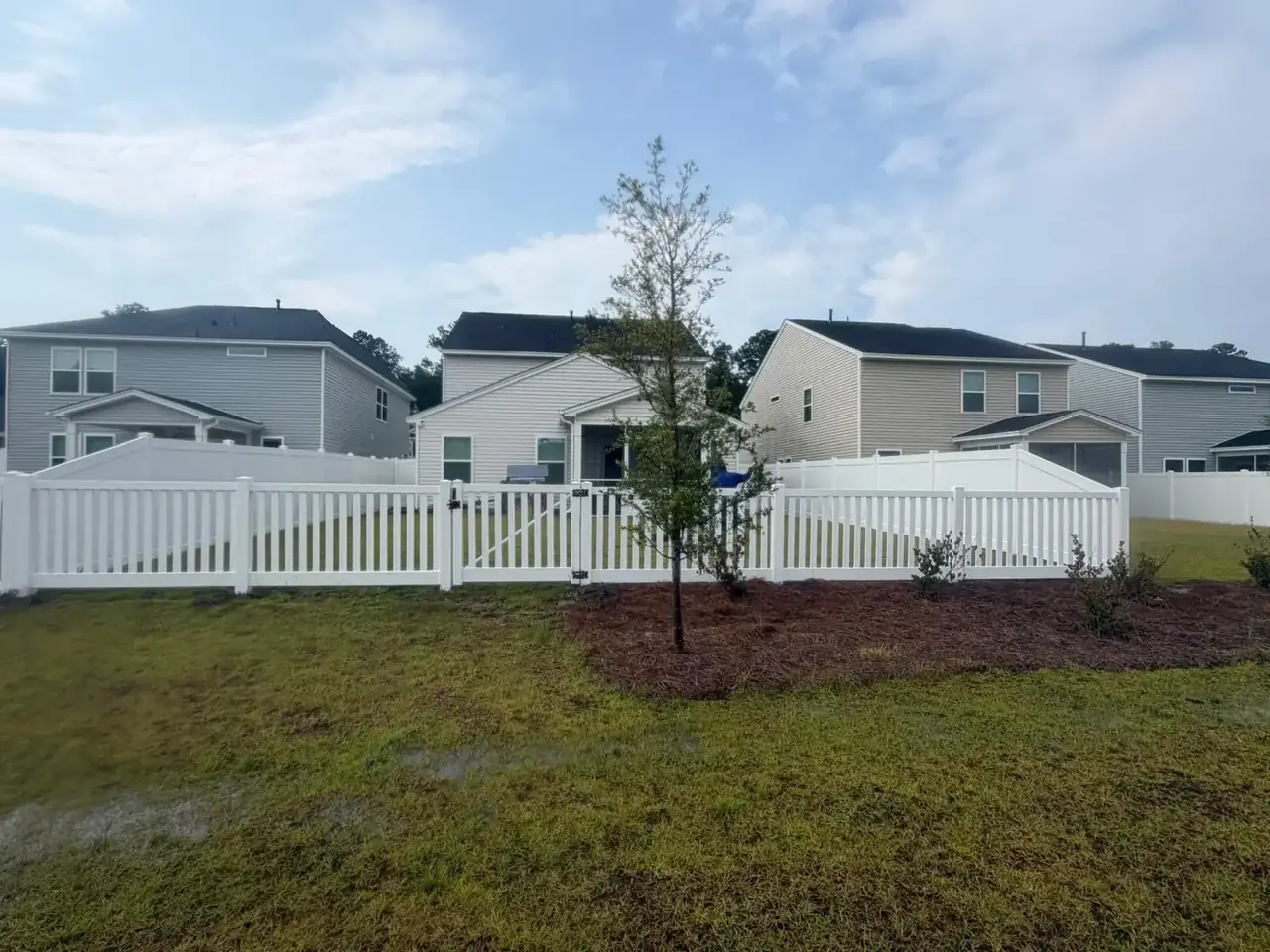 Omega Fence white vinyl yard fence