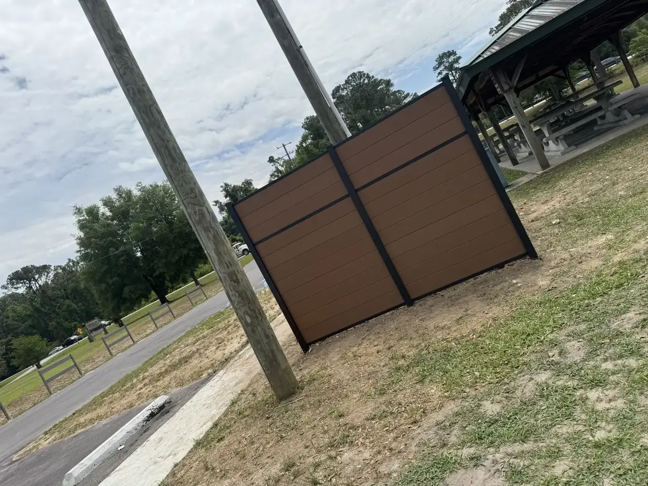 Commercial brown privacy fence enclosure